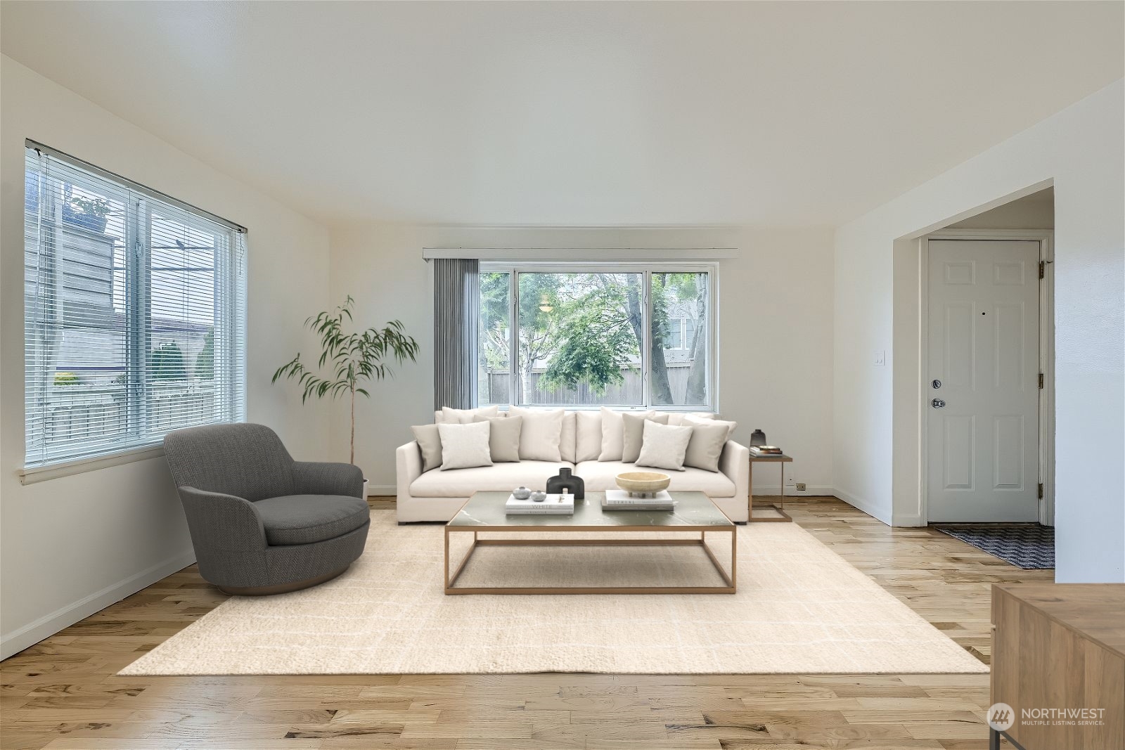8536 Nesbit Avenue North, Unit A Seattle, WA 98103 - Photo 7 of 32 a living room with furniture and a large window