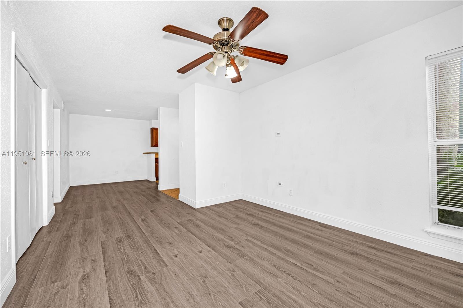 833 Riverside Drive, Unit 811 Coral Springs, FL 33071 - Photo 13 of 26 a view of empty room with wooden floor