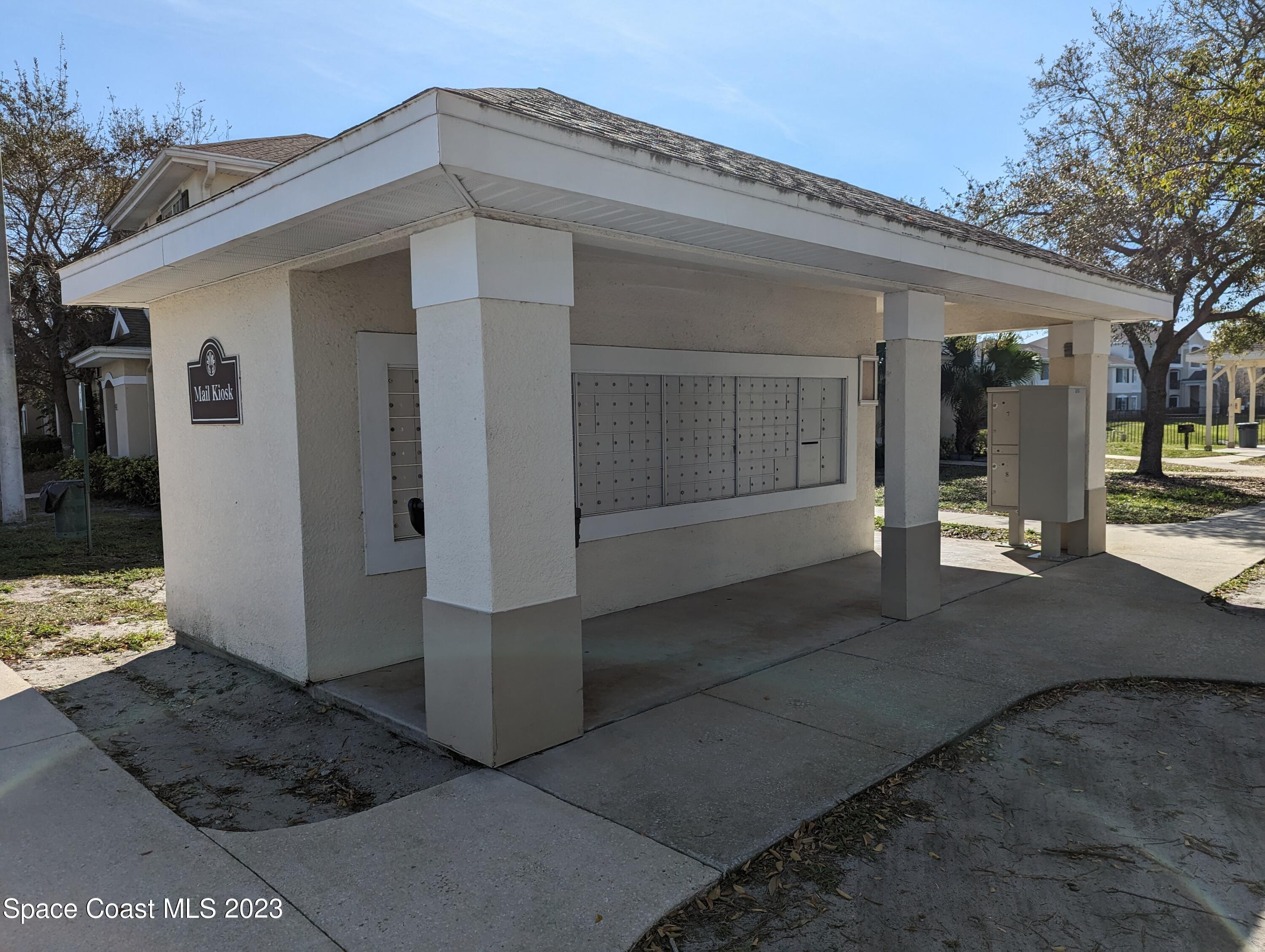3511 D'Avinci Way, Unit 2012 Melbourne, FL 32901 - Photo 17 of 22 a front view of a house