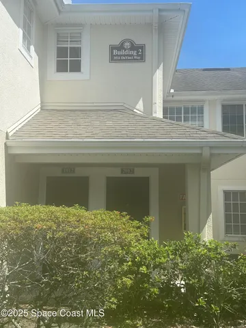 a view of a house with a garage
