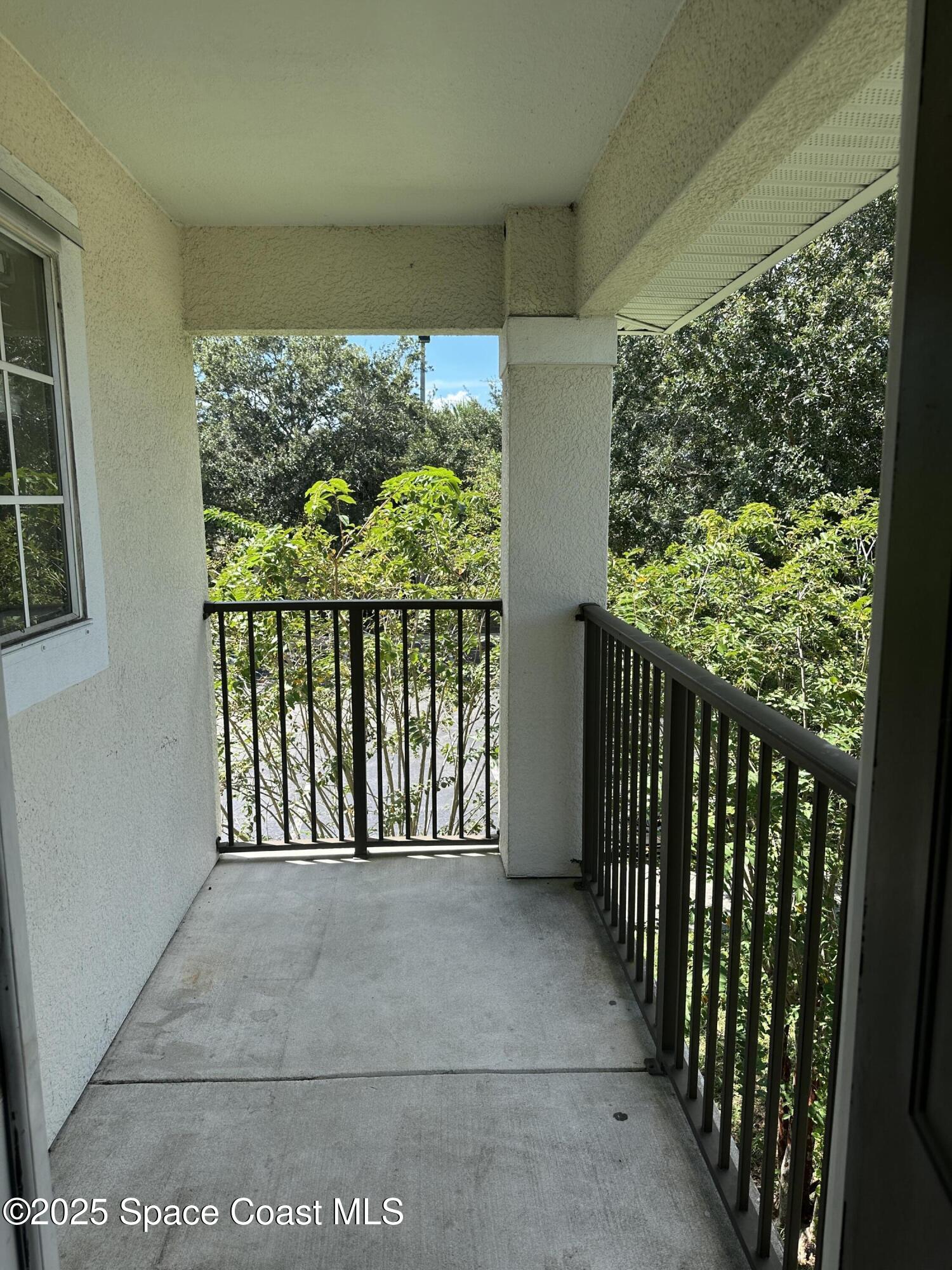 3511 D'Avinci Way, Unit 2012 Melbourne, FL 32901 - Photo 10 of 22 a view of a porch