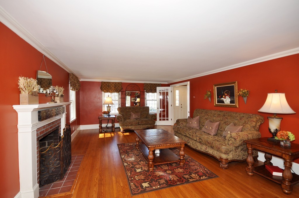 80 Spring Road Concord, MA 01742 - Photo 2 of 21 a living room with furniture and a fireplace