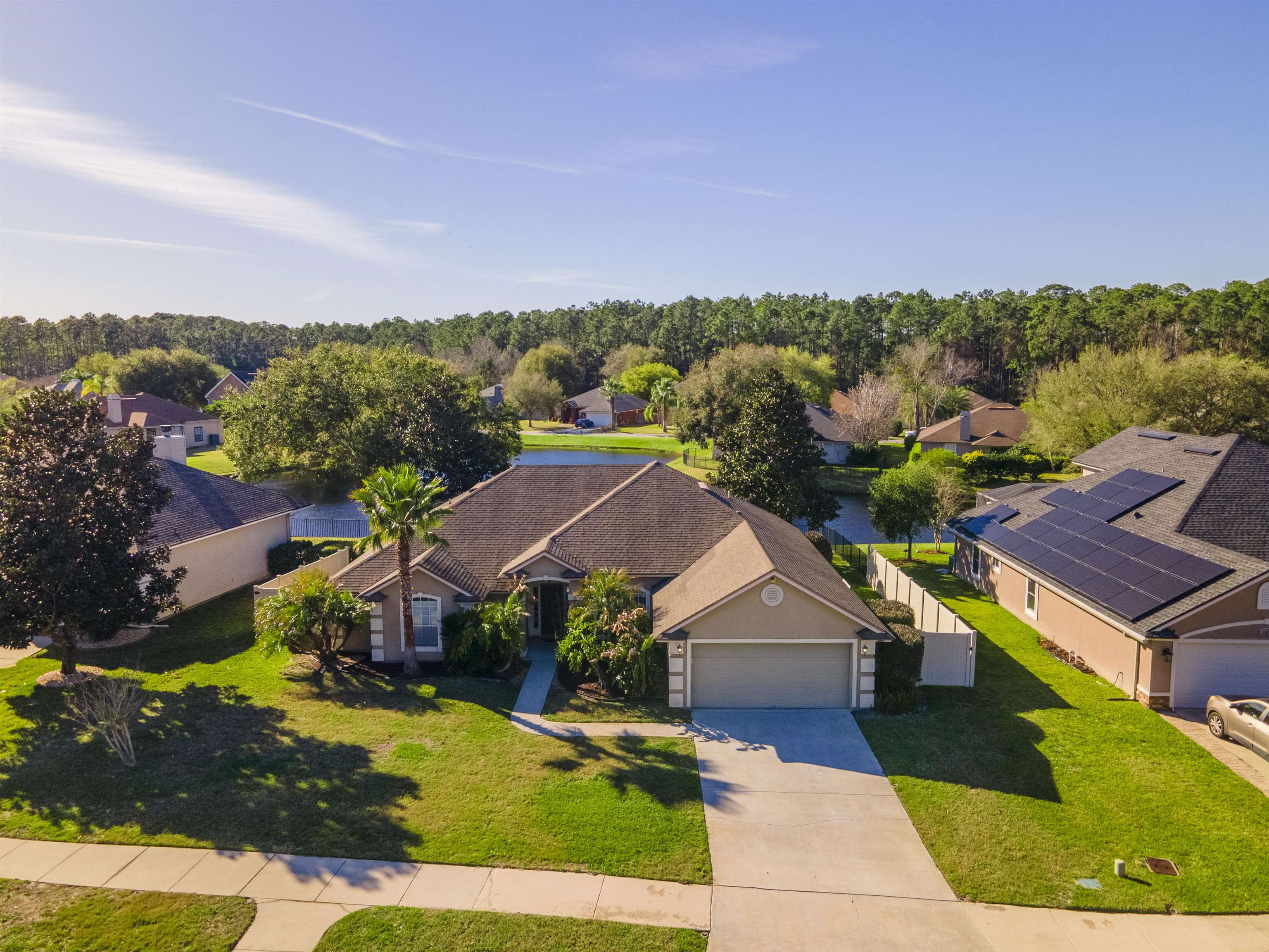 145 Whisper Ridge Drive St. Augustine, FL 32092 - Photo 4 of 32 an aerial view of a house