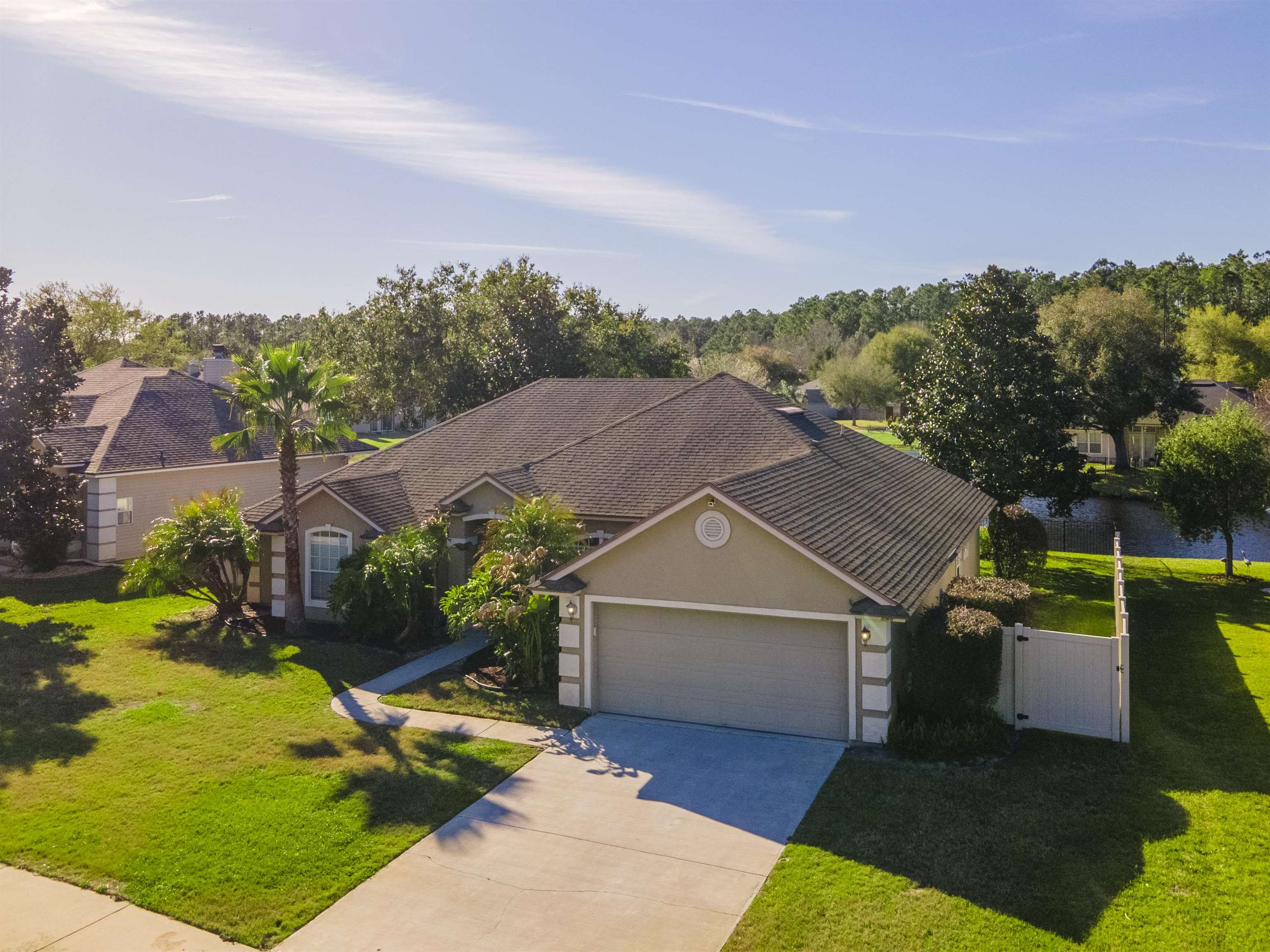 145 Whisper Ridge Drive St. Augustine, FL 32092 - Photo 5 of 32 an aerial view of a house