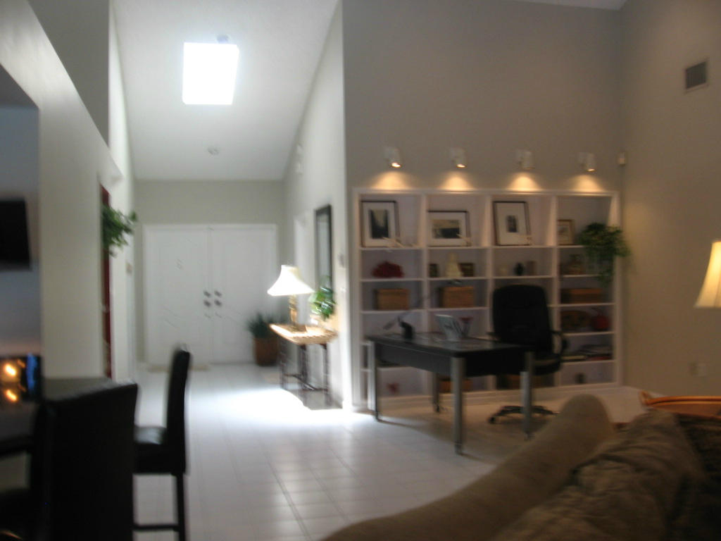 245 Northwest 70th Street Boca Raton, FL 33487 - Photo 31 of 39 a living room with furniture