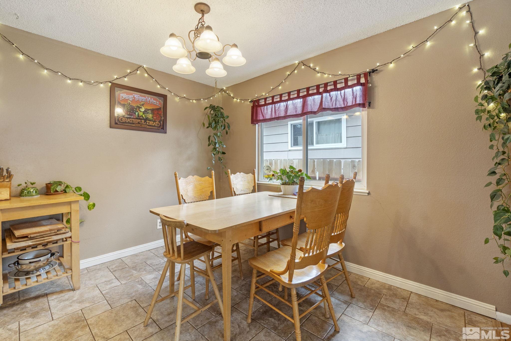 1480 Rayburn Drive Reno, NV 89503 - Photo 11 of 29 a dining room with furniture and window