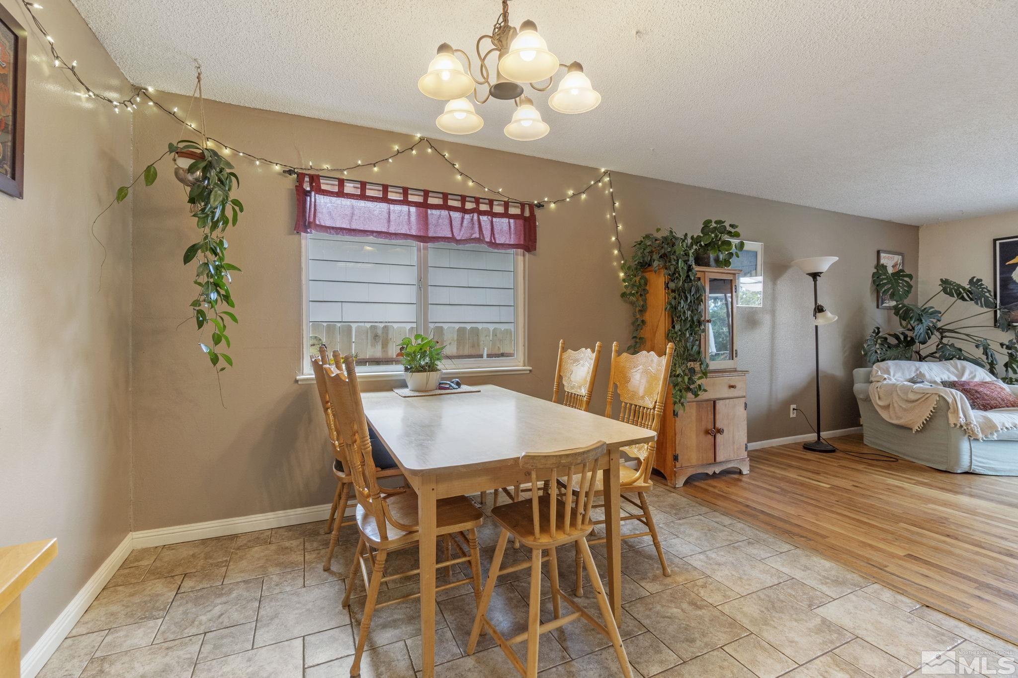 1480 Rayburn Drive Reno, NV 89503 - Photo 12 of 29 a dining room with furniture and window