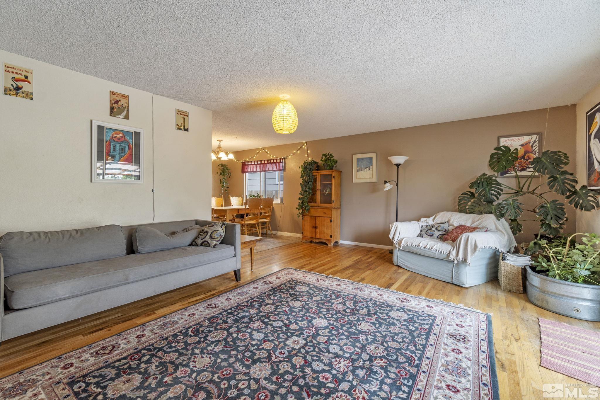 1480 Rayburn Drive Reno, NV 89503 - Photo 4 of 29 a living room with furniture and a couch