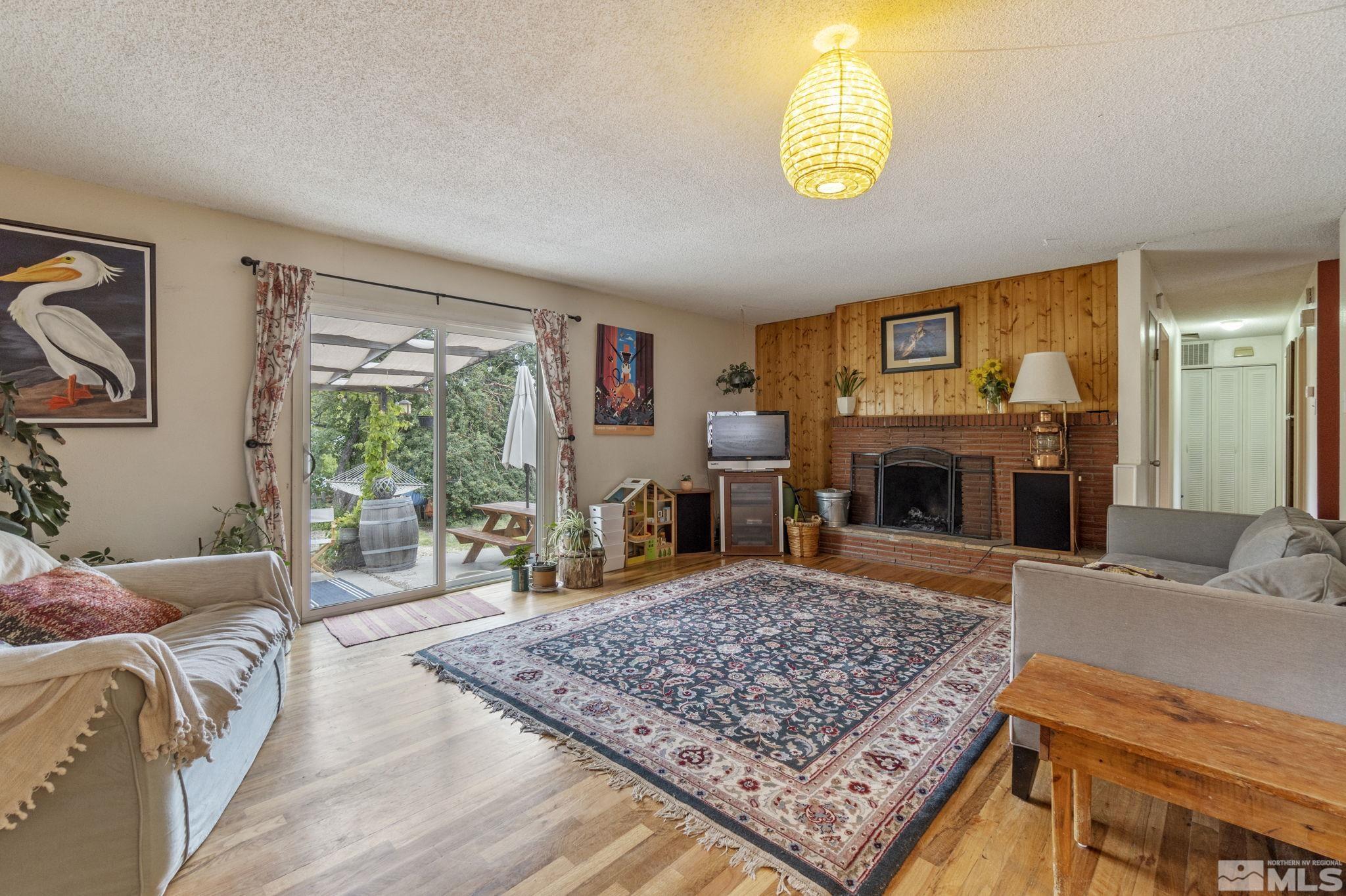 1480 Rayburn Drive Reno, NV 89503 - Photo 5 of 29 a living room with furniture rug and window