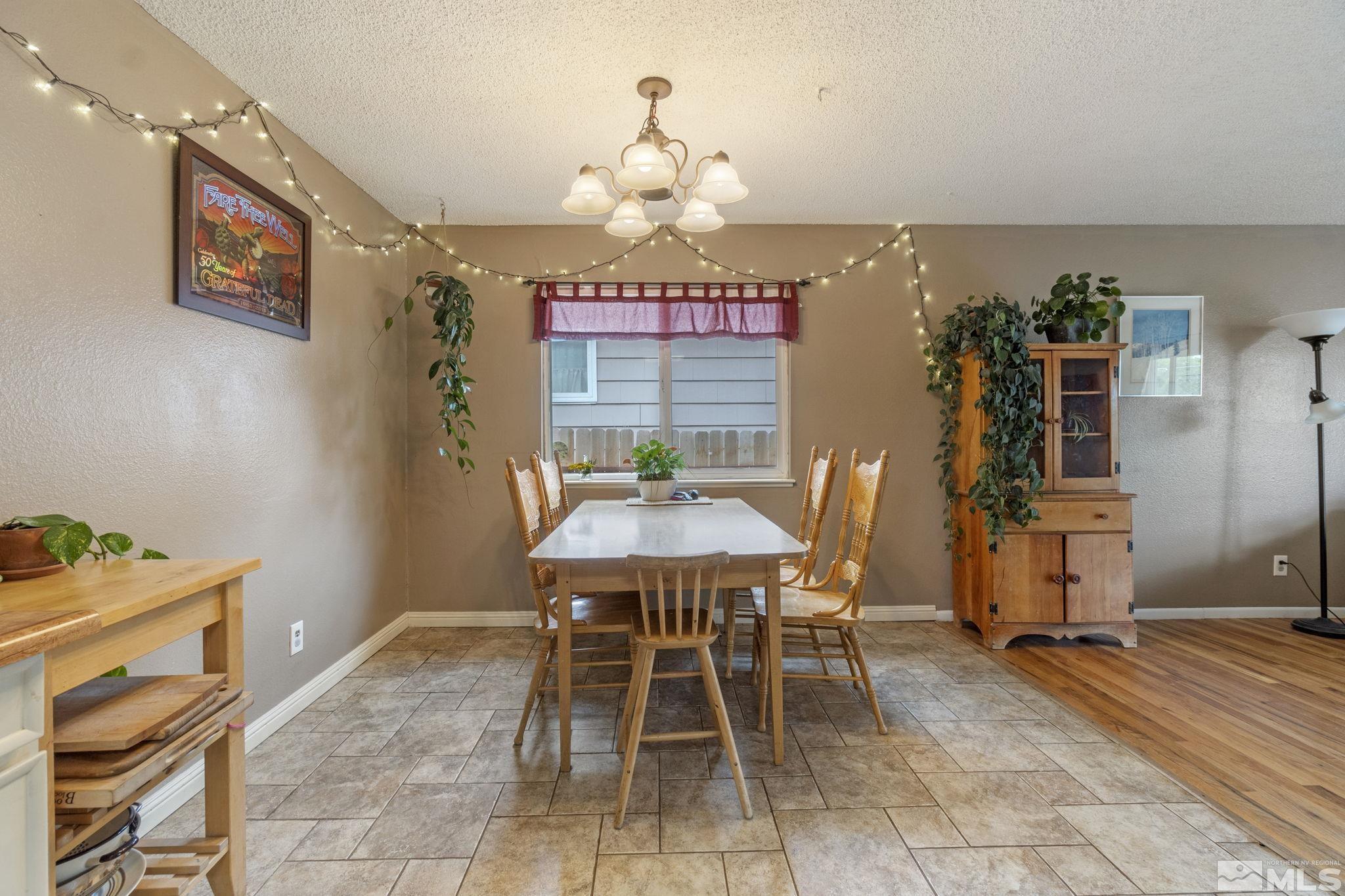 1480 Rayburn Drive Reno, NV 89503 - Photo 10 of 29 a dining room with a table and chairs