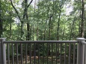 a view of a swimming pool with a yard