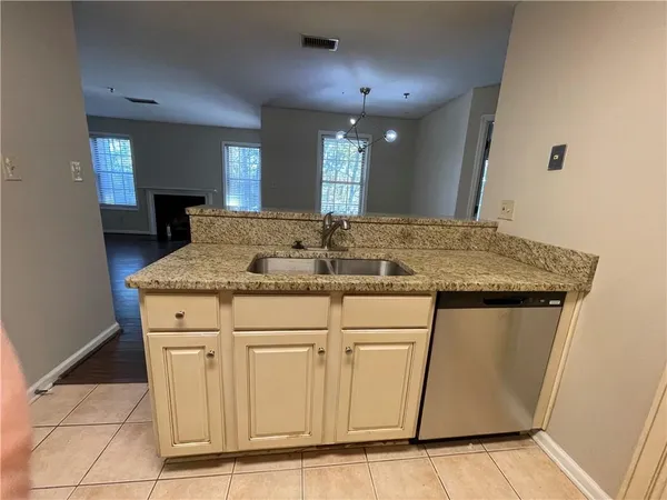 a bathroom with a shower and toilet