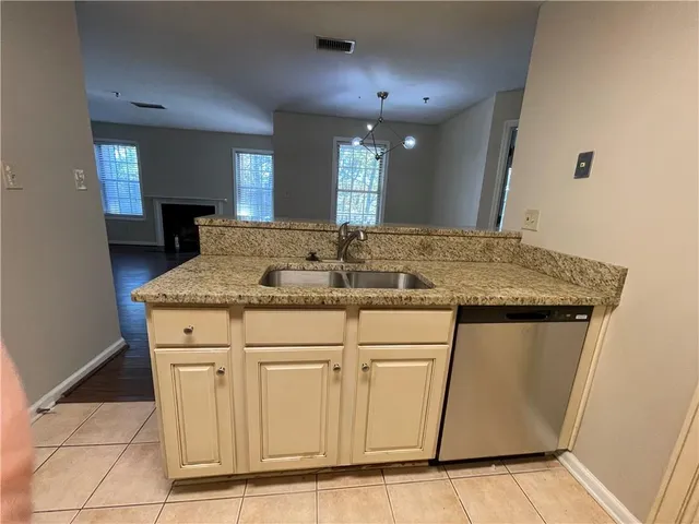 a bathroom with a shower and toilet