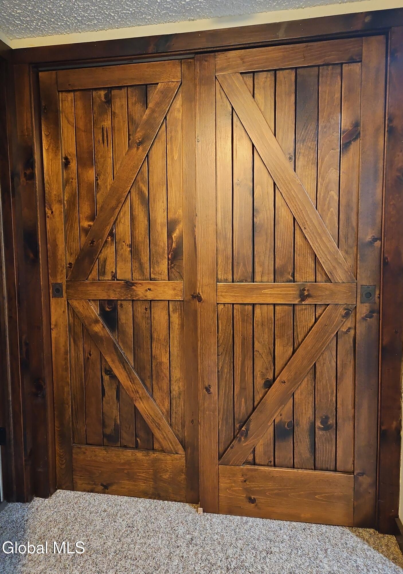 11 Sullivan Road Lake George, NY 12845 - Photo 34 of 47 Custom barn doors to utilities