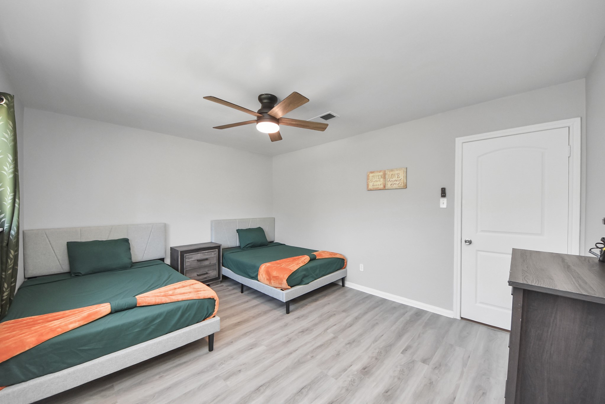 1011 Whitestone Lane Houston, TX 77073 - Photo 14 of 48 a living room with furniture and a wooden floor