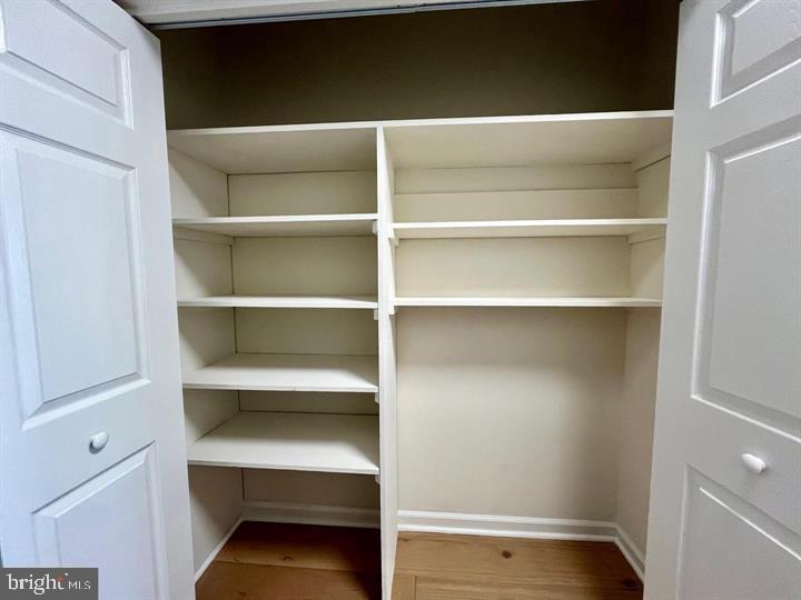 4141 North Henderson Road, Unit 912 Arlington, VA 22203 - Photo 12 of 17 Spacious, organized Pantry with ample shelving.