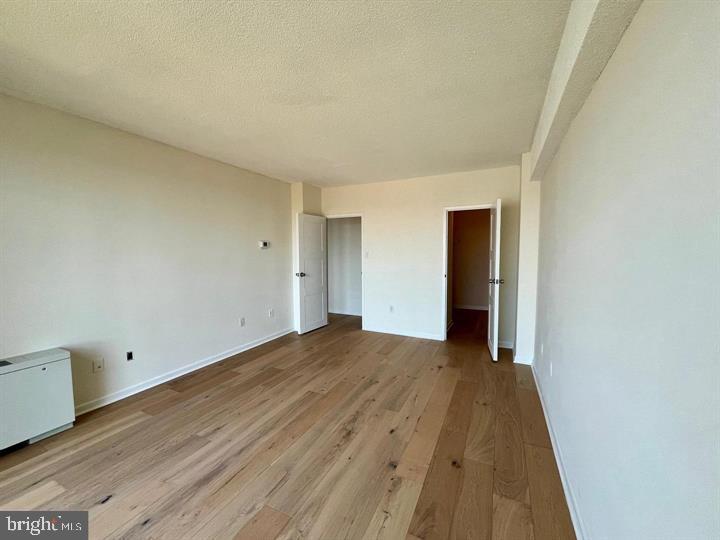 4141 North Henderson Road, Unit 912 Arlington, VA 22203 - Photo 13 of 17 Spacious, sunlit room ready for your vision.