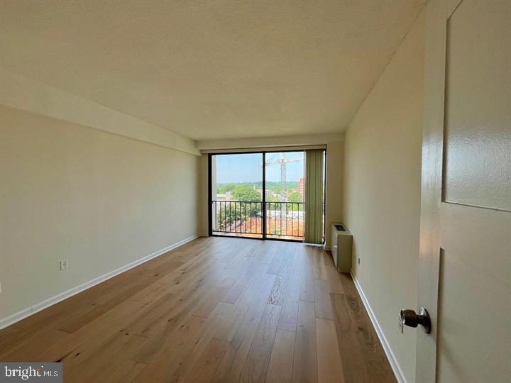 4141 North Henderson Road, Unit 912 Arlington, VA 22203 - Photo 14 of 17 Bright and airy space with scenic views.