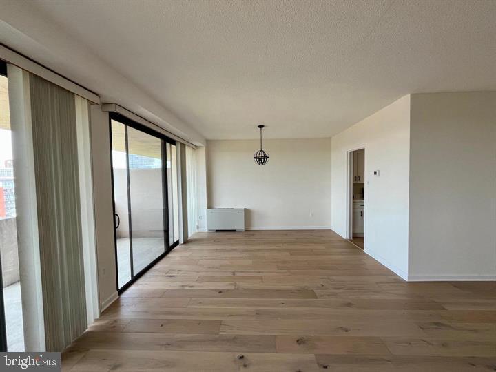 4141 North Henderson Road, Unit 912 Arlington, VA 22203 - Photo 10 of 17 Spacious, sunlit living area with modern charm.