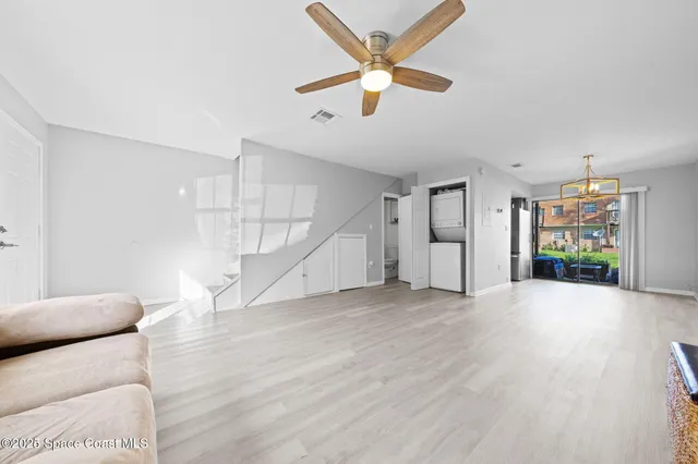 a view of livingroom and hardwood floor