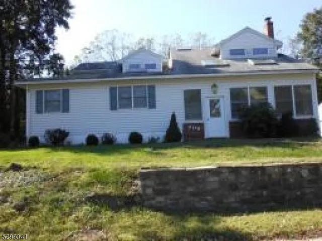 front view of house with a yard