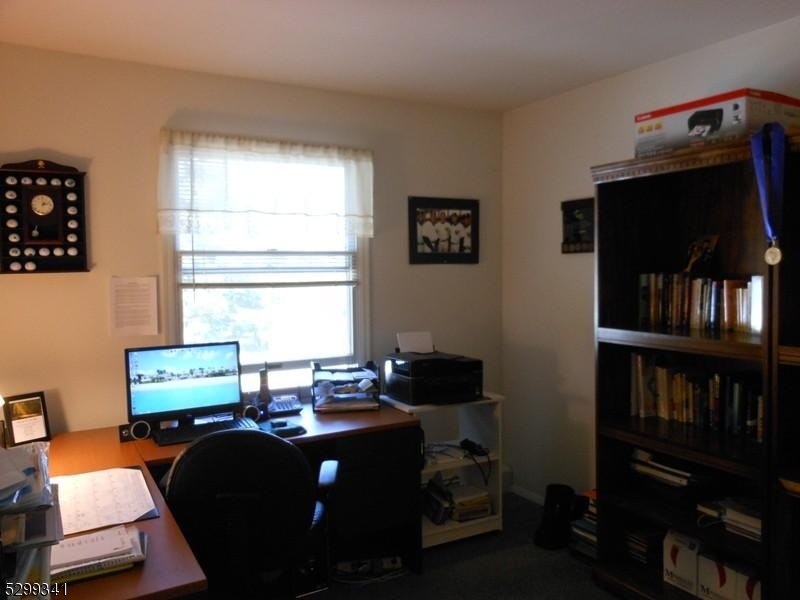 206 Ryerson Road Lincoln Park, NJ 07035 - Photo 15 of 23 a workspace with furniture and window