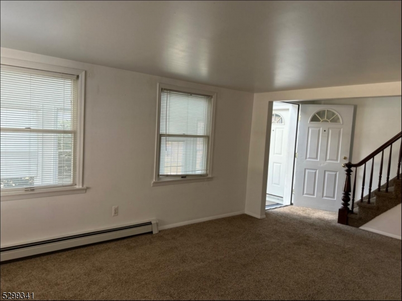 206 Ryerson Road Lincoln Park, NJ 07035 - Photo 19 of 23 an empty room with staircase