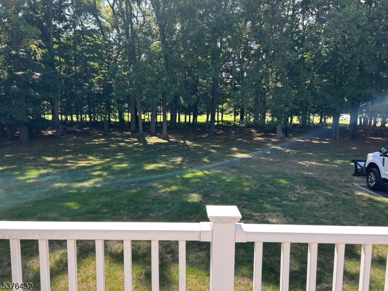 206 Ryerson Road Lincoln Park, NJ 07035 - Photo 22 of 23 a view of a yard with large trees