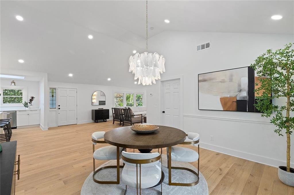 1275 The By Way Northeast Atlanta, GA 30306 - Photo 21 of 48 a view of a dining room with furniture and wooden floor