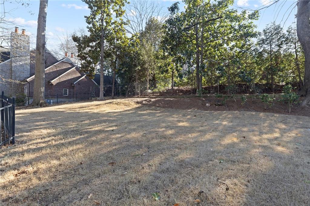 1275 The By Way Northeast Atlanta, GA 30306 - Photo 42 of 48 a view of a yard with a house