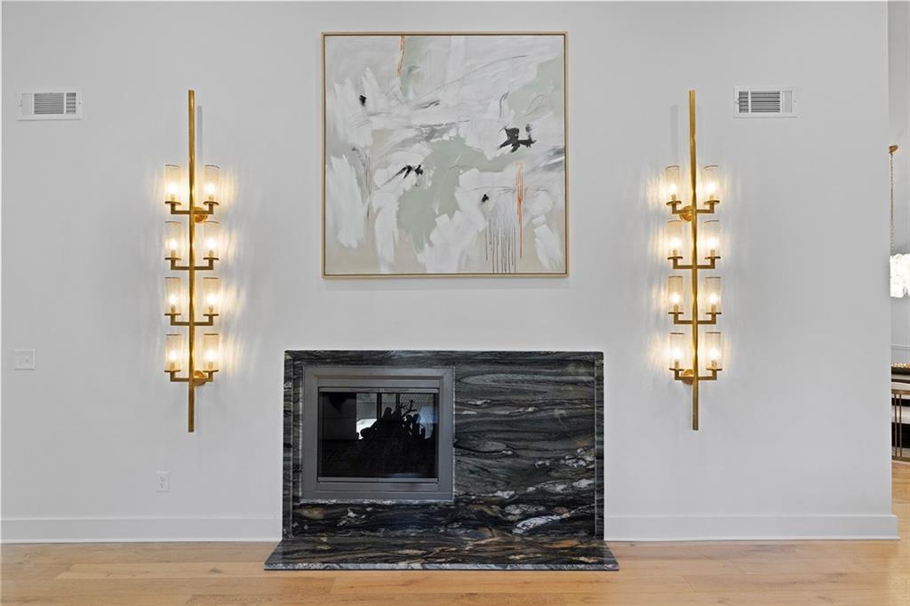 1275 The By Way Northeast Atlanta, GA 30306 - Photo 6 of 48 a front view of a house with fireplace
