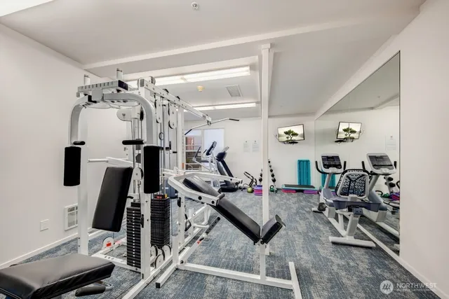 a view of a room with gym equipment