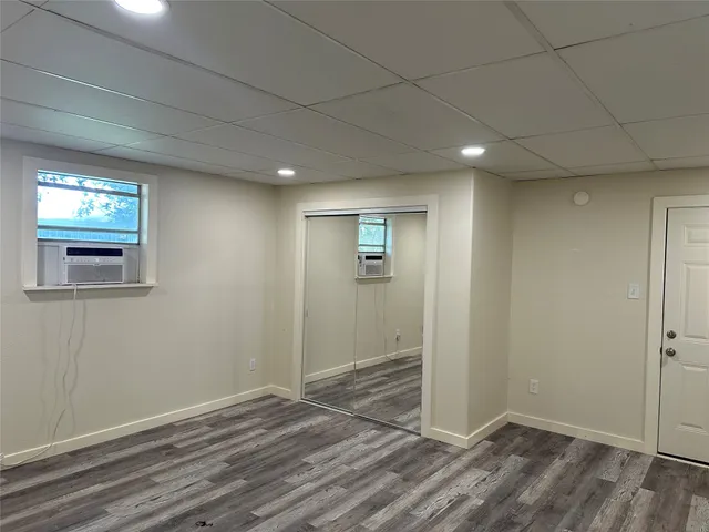 a view of livingroom with hardwood floor and hallway