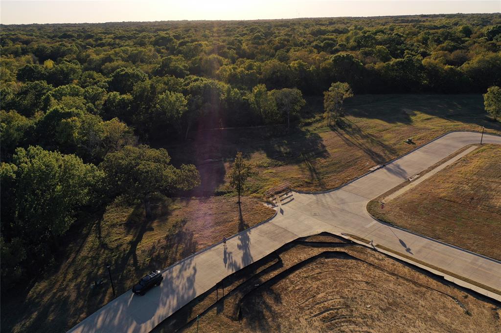 2712 Spring Lake Drive Sherman, TX 75092 - Photo 14 of 37 a view of a lake from a balcony
