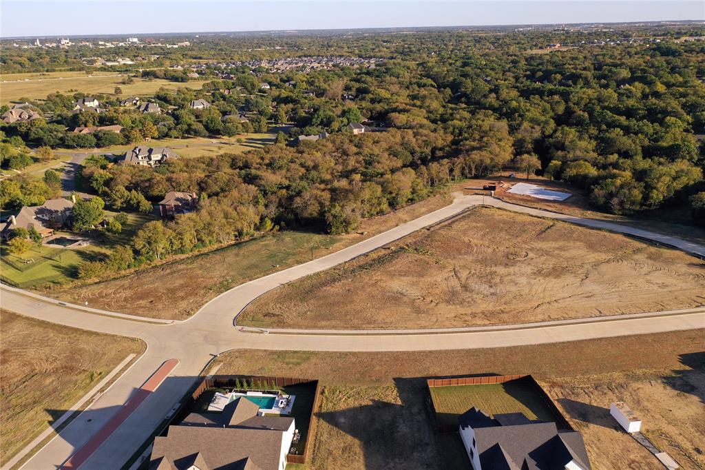 2712 Spring Lake Drive Sherman, TX 75092 - Photo 26 of 37 an aerial view of residential houses with outdoor space