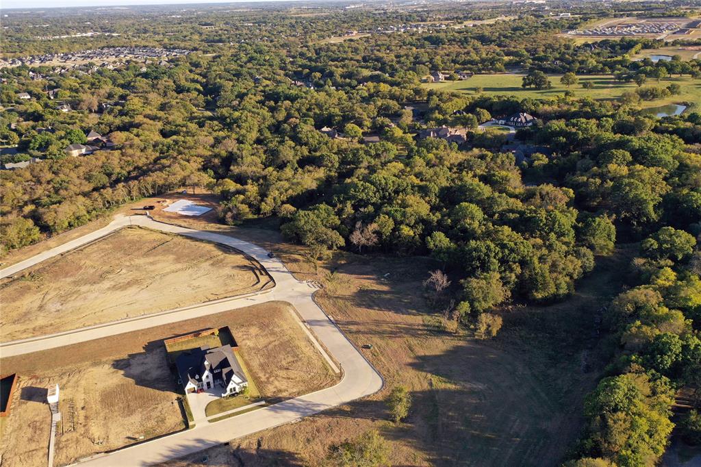 2712 Spring Lake Drive Sherman, TX 75092 - Photo 28 of 37 an aerial view of residential houses with outdoor space