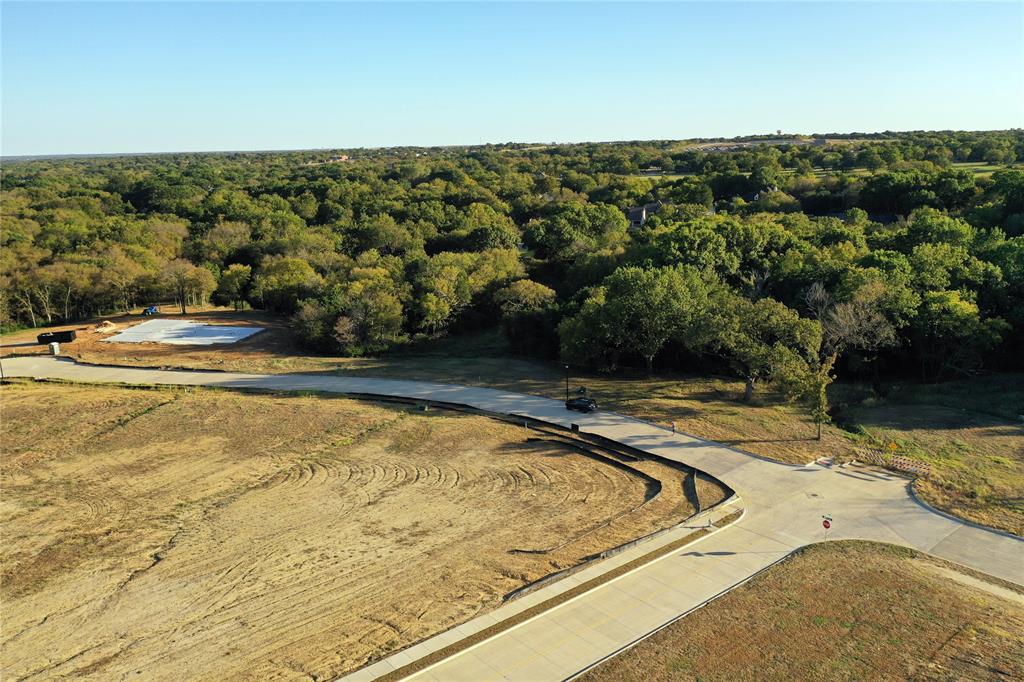 2712 Spring Lake Drive Sherman, TX 75092 - Photo 8 of 37 a view of a swimming pool with an ocean view