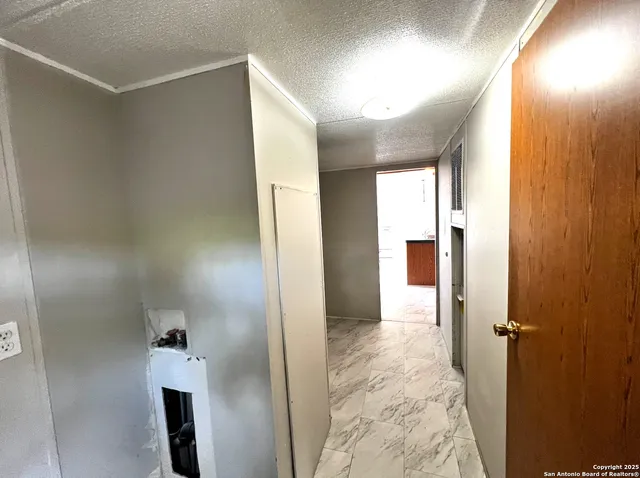 a bathroom with a tub and shower