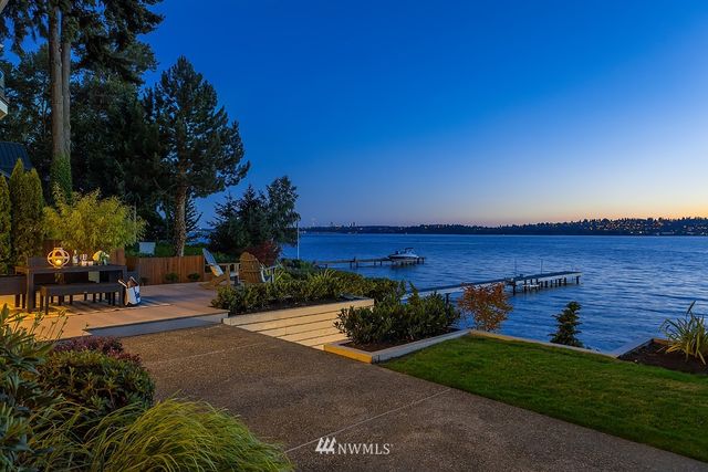 a view of a street with a building in the background