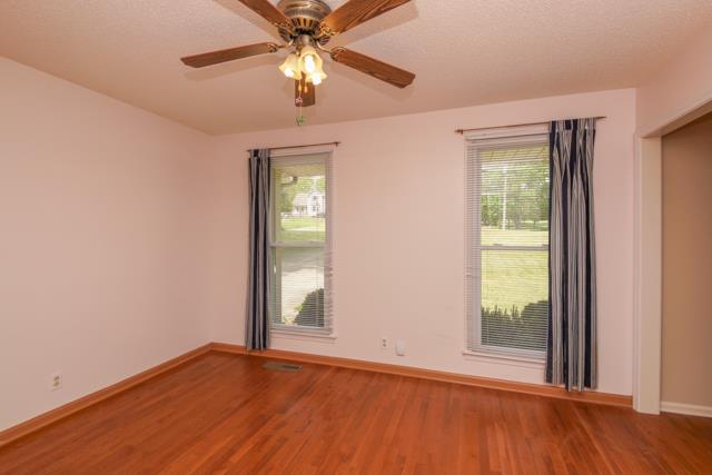 4045 Sawmill Road Woodlawn, TN 37191 - Photo 6 of 20 Elegant formal dining room has hardwood floors and double windows that allow gorgeous views during meal times.