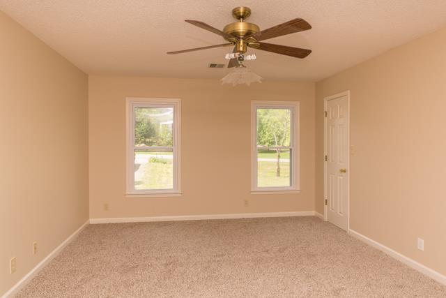 4045 Sawmill Road Woodlawn, TN 37191 - Photo 8 of 20 Large master bedroom has been freshly painted, NEW carpet, double windows, walk-in closet & ceiling fan!