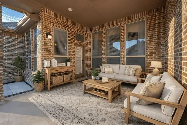 a front view of house with yard and outdoor seating