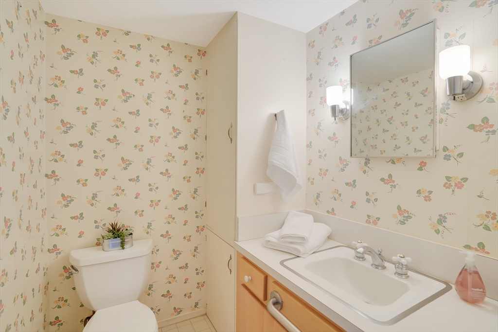 453 Lighthouse Road Aquinnah, MA 02535 - Photo 20 of 39 a bathroom with a sink toilet and shower