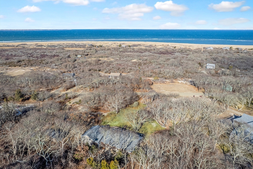 453 Lighthouse Road Aquinnah, MA 02535 - Photo 33 of 39 a view of an ocean beach