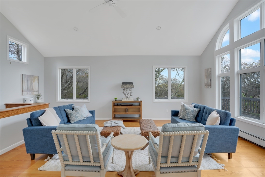 453 Lighthouse Road Aquinnah, MA 02535 - Photo 4 of 39 a living room with furniture and a large window