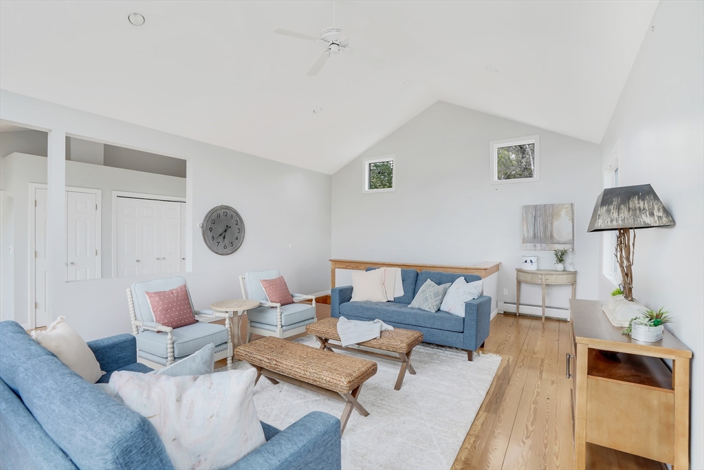 453 Lighthouse Road Aquinnah, MA 02535 - Photo 5 of 39 a living room with furniture and a table