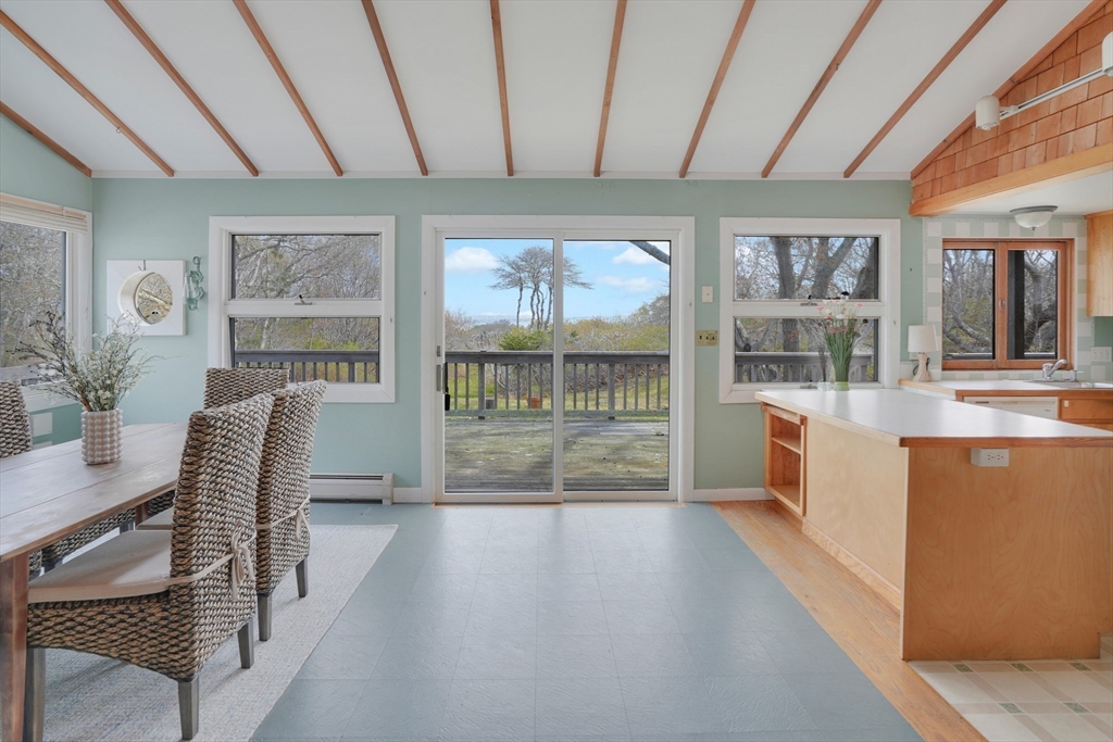 453 Lighthouse Road Aquinnah, MA 02535 - Photo 8 of 39 a dining room with furniture and window