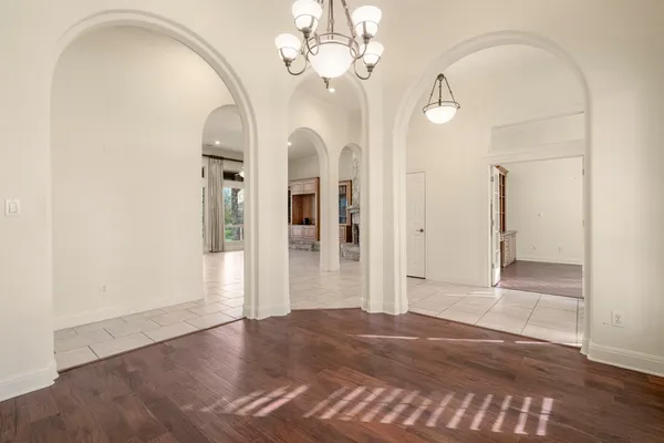 a view of a livingroom with wooden floor