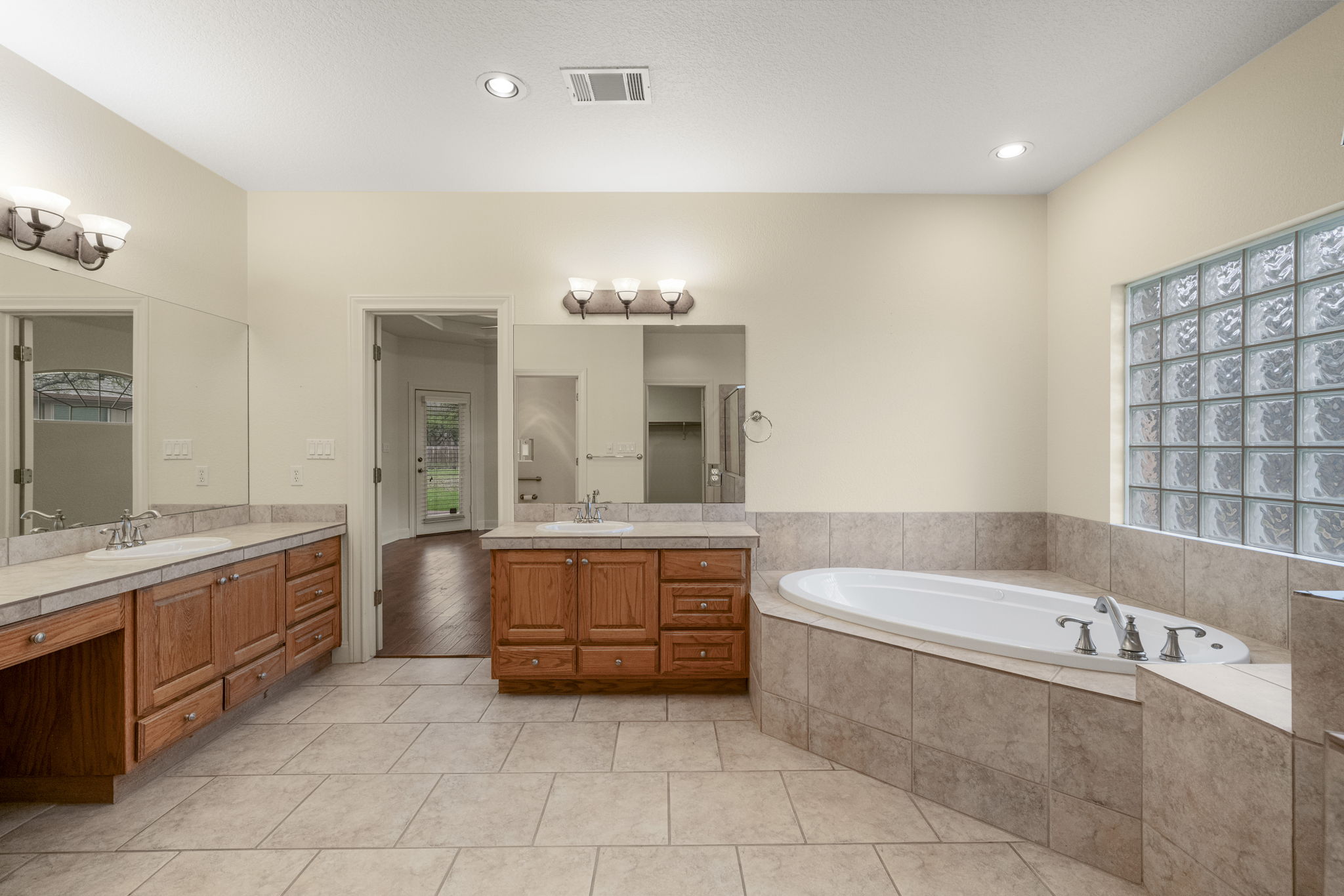 301 Goldridge Drive Georgetown, TX 78633 - Photo 20 of 40 The ensuite features two separate vanities for abundant storage and counter space.