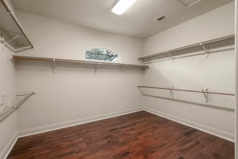 a view of a room with racks on the wall